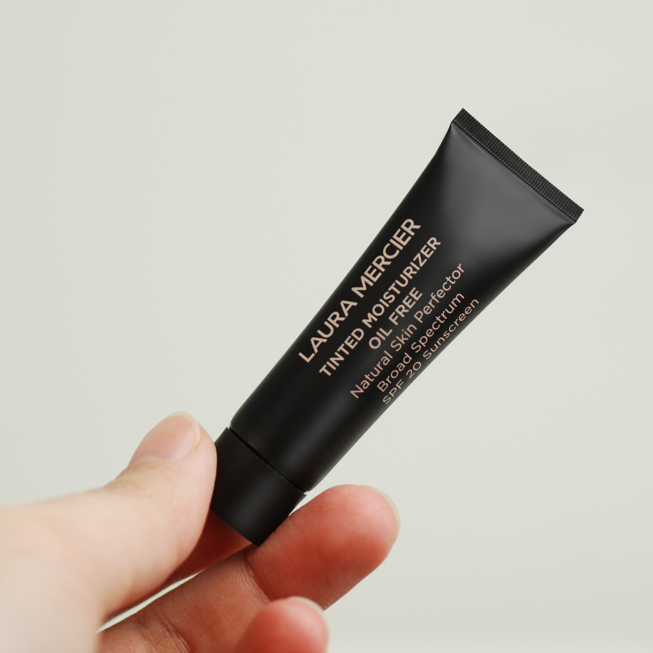 Laura Mercier Tinted Moisturizer sample in a 5 ml mini tube